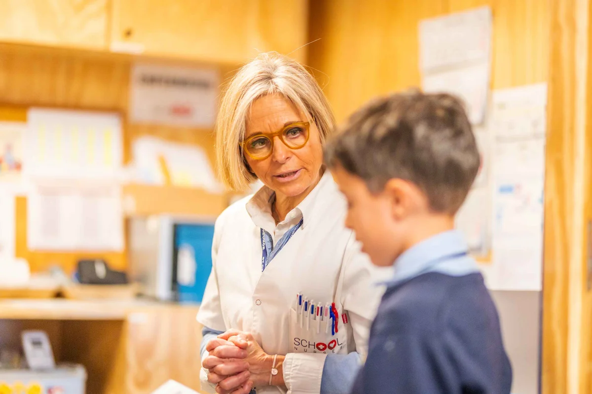 Teacher talking to a student