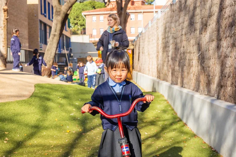 little girl on a bicycle